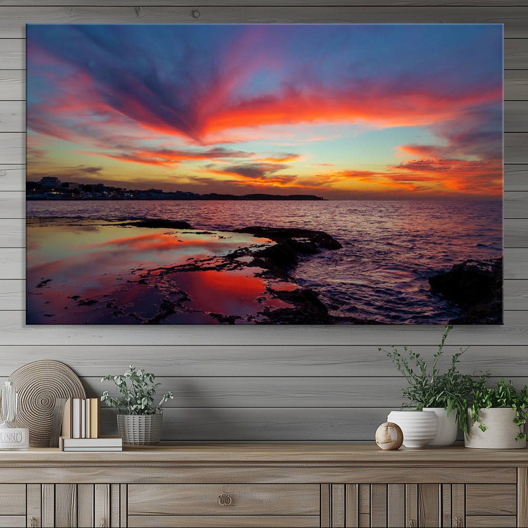 The Glorious Sunset on The Beach canvas print adorns the dining room.