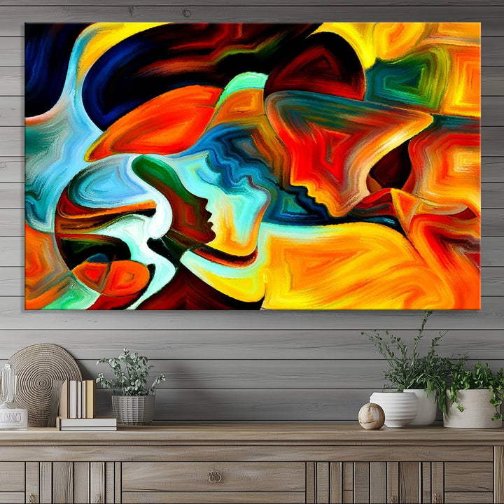 The kitchen wall features the Human Love Figures Abstract Wall Art Canvas Print.