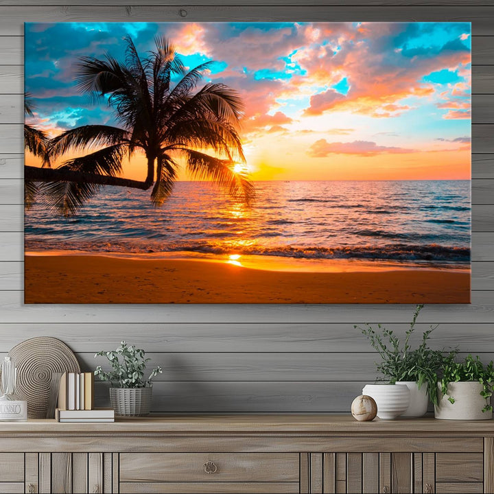 The Palm Tree Sunset On The Beach ready-to-hang canvas wall art—museum quality—brings a serene atmosphere to the room.