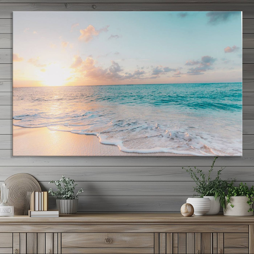 The room features a 3-panel Tranquil Ocean Beach Sunset Canvas Wall Art.