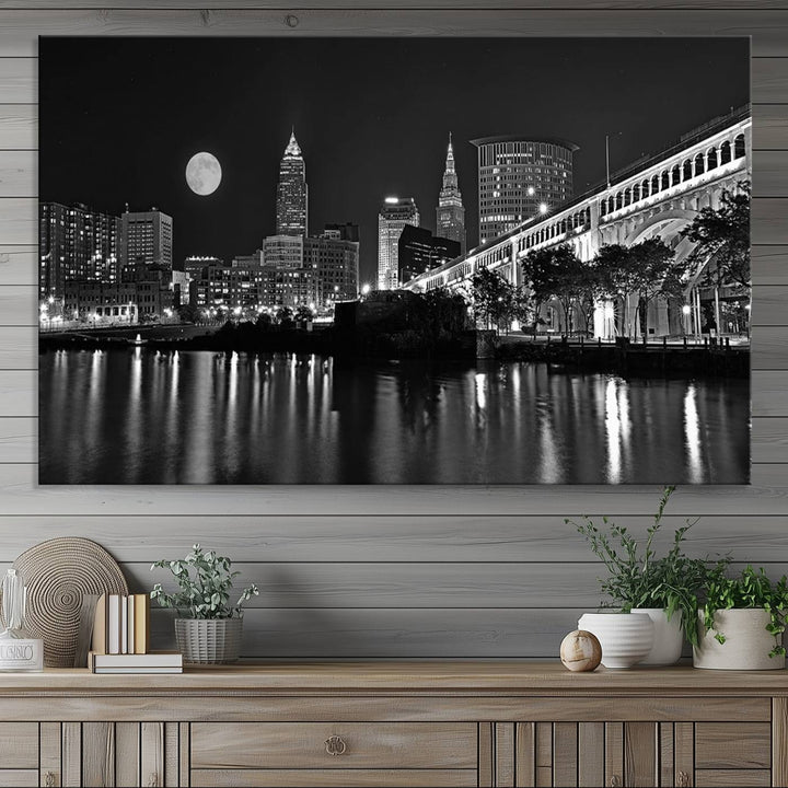 Cleveland Night Skyline Canvas Print: A museum-quality piece, ready to hang, featuring a stunning full moon and its reflections below.