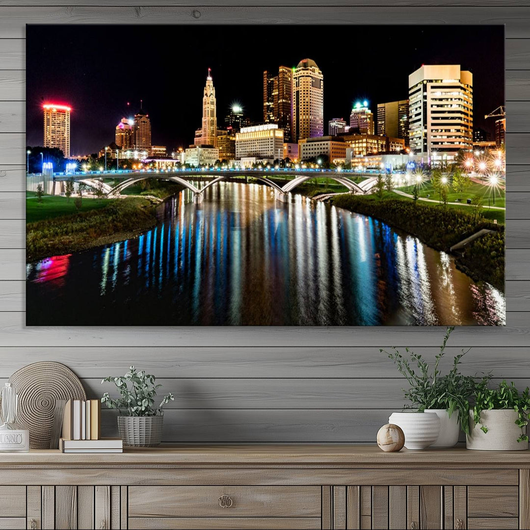 The Columbus City Lights Night Skyline Wall Art Canvas Print adorns the wall.