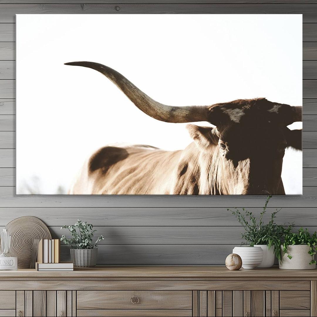 A 3-panel Texas Longhorn canvas adds a touch of rustic Western decor.