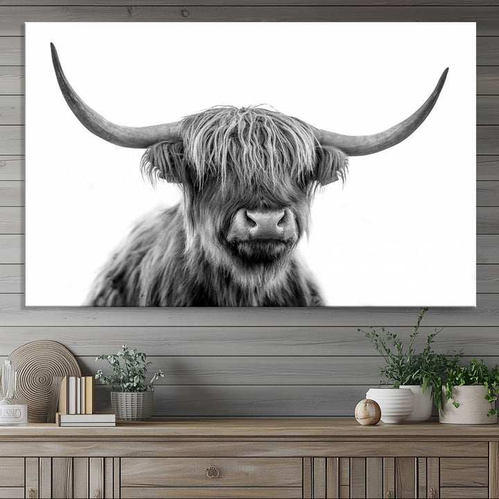 A Scottish Highland Cow Art Canvas adds charm to the farmhouse decor.