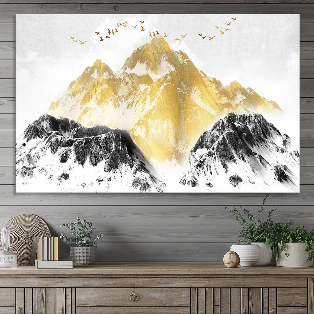 Golden Mountain Triptych Wall Art features gold-tinted mountains and birds.