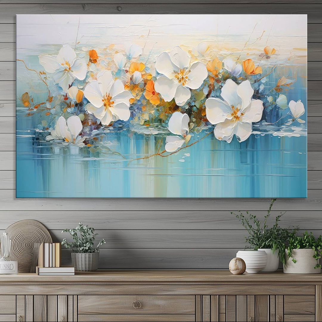 An Abstract Flower Wall Art Canvas Print in blue and orange hues.