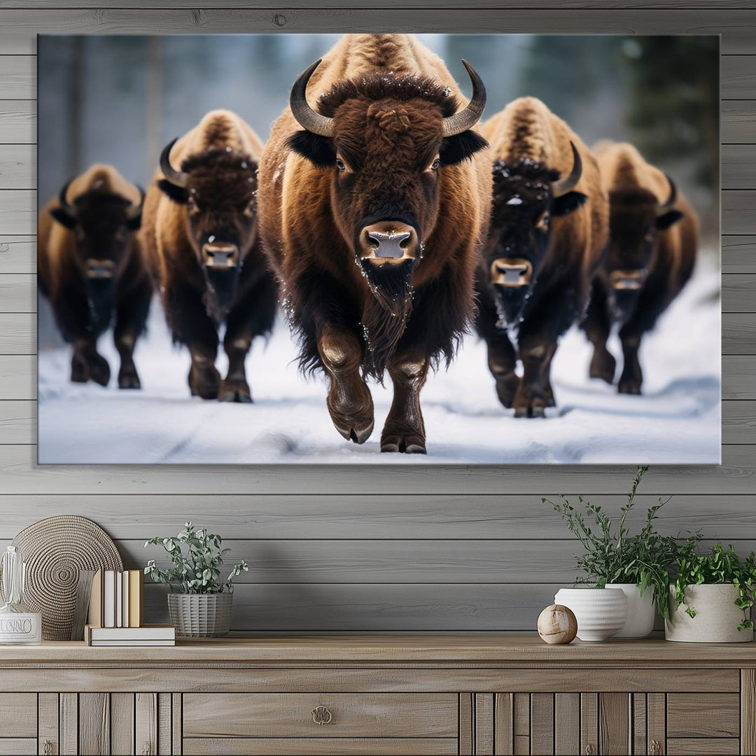 The dining room features an American Bison Herd Canvas Print against the snow.