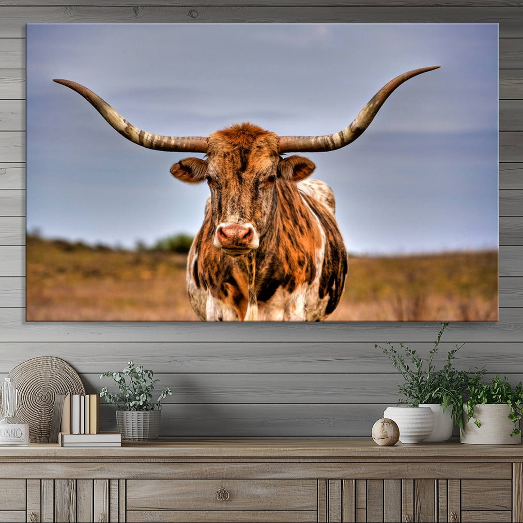 The Texas Longhorn Wall Art Print is displayed in a stylish living room.