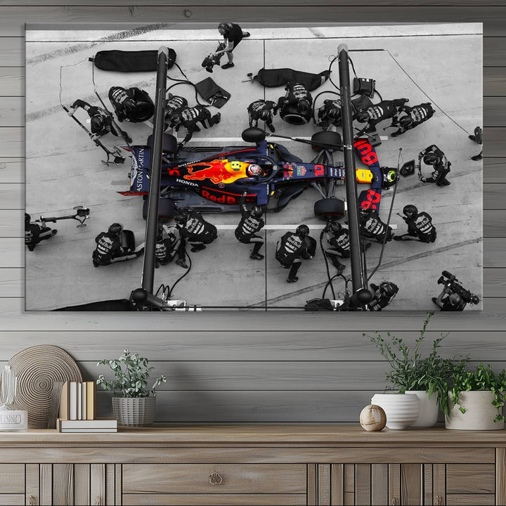 Red Bull Formula 1 Canvas Wall Art Print: An aerial view of a Formula 1 pit stop featuring a Red Bull car on premium canvas.