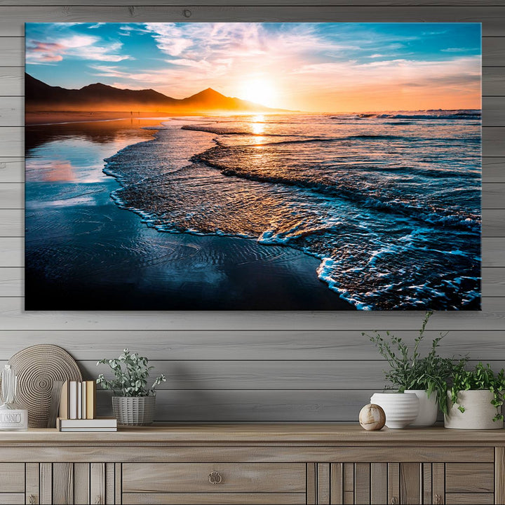 The Sunset Beach Ocean Canvas Wall Art – Tranquil Reflections at Dusk enhances the ambiance with its captivating depiction of serene ocean views at dusk.