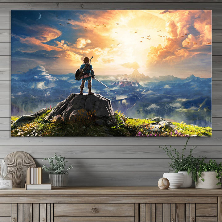 A vibrant Legend of Zelda Breath of the Wild canvas print depicts a figure standing on a rock with mountains and sky in the background.