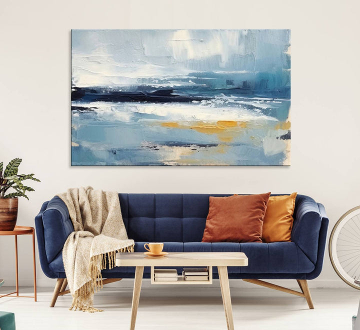 The Abstract Ocean Canvas Wall Art in coastal blue and gold enhances the modern kitchen.