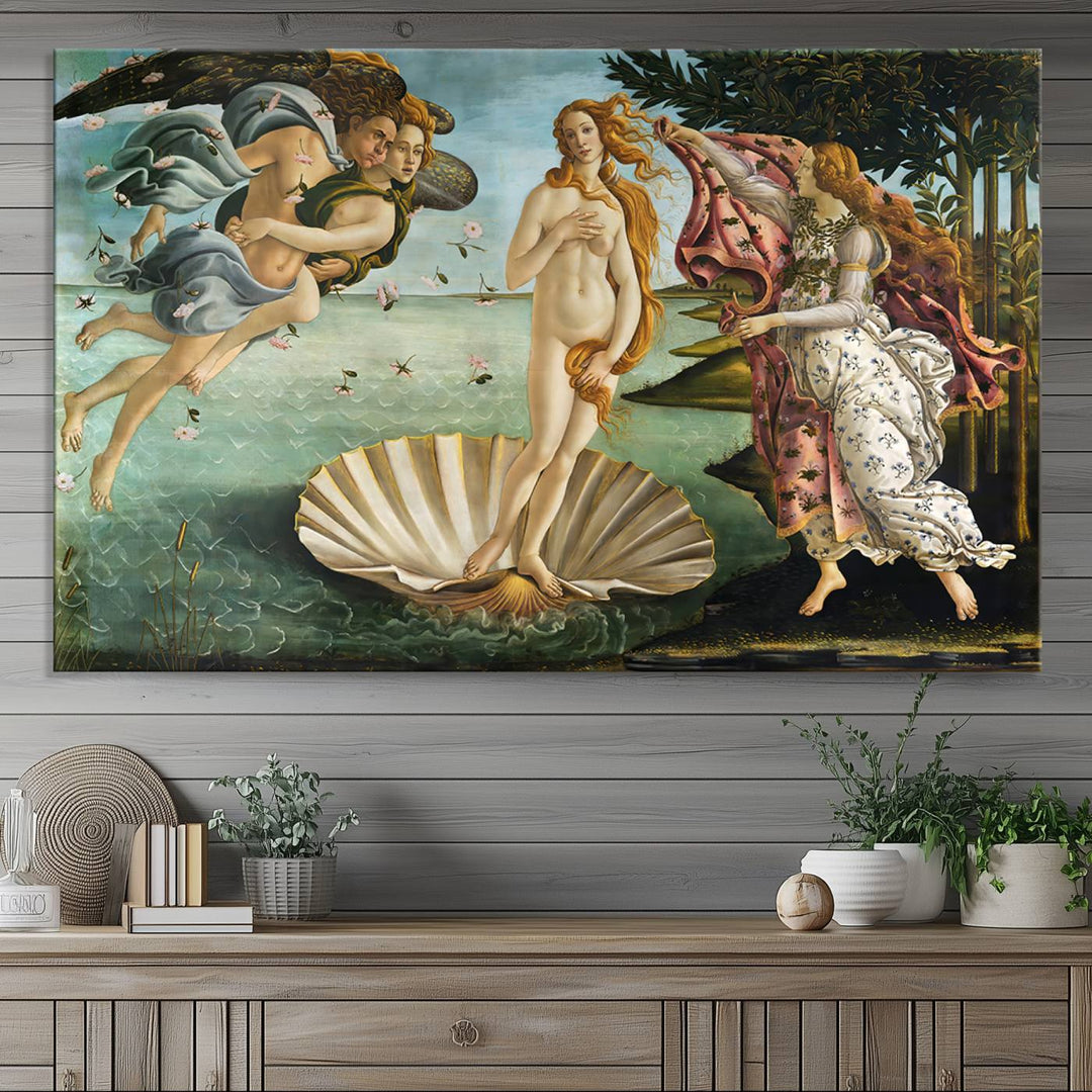 A canvas print of Botticellis The Birth of Venus is displayed on the wall.