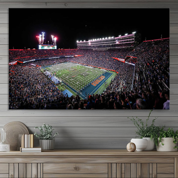 The Gators Night Game Canvas Art captures a lively night at Ben Hill Griffin Stadium with vibrant fireworks and the energy of a live band.