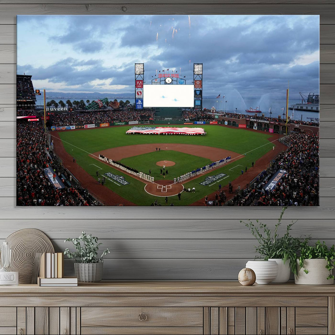 This framed 3-panel canvas MLB wall art features a giant flag and fans under a cloudy sky at Oracle Park.