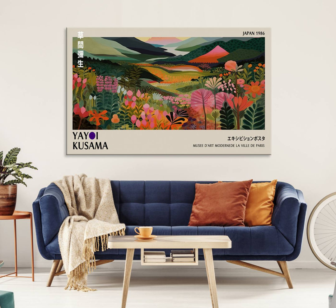 Yayoi Kusamas Landscape Canvas Print with vibrant floral mountain art adorns the wall.