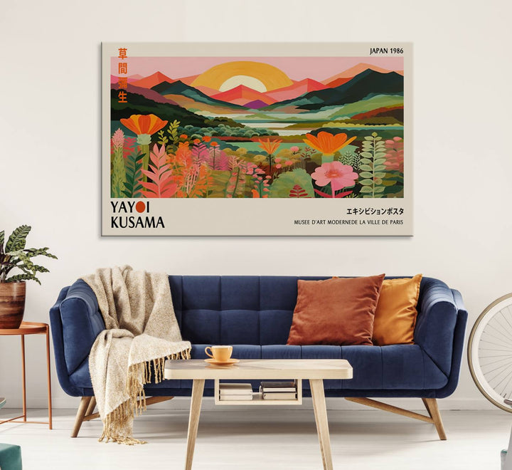 The Yayoi Kusama Landscape Canvas Print, featuring vibrant floral mountains and sunset scenery, enhances the room.