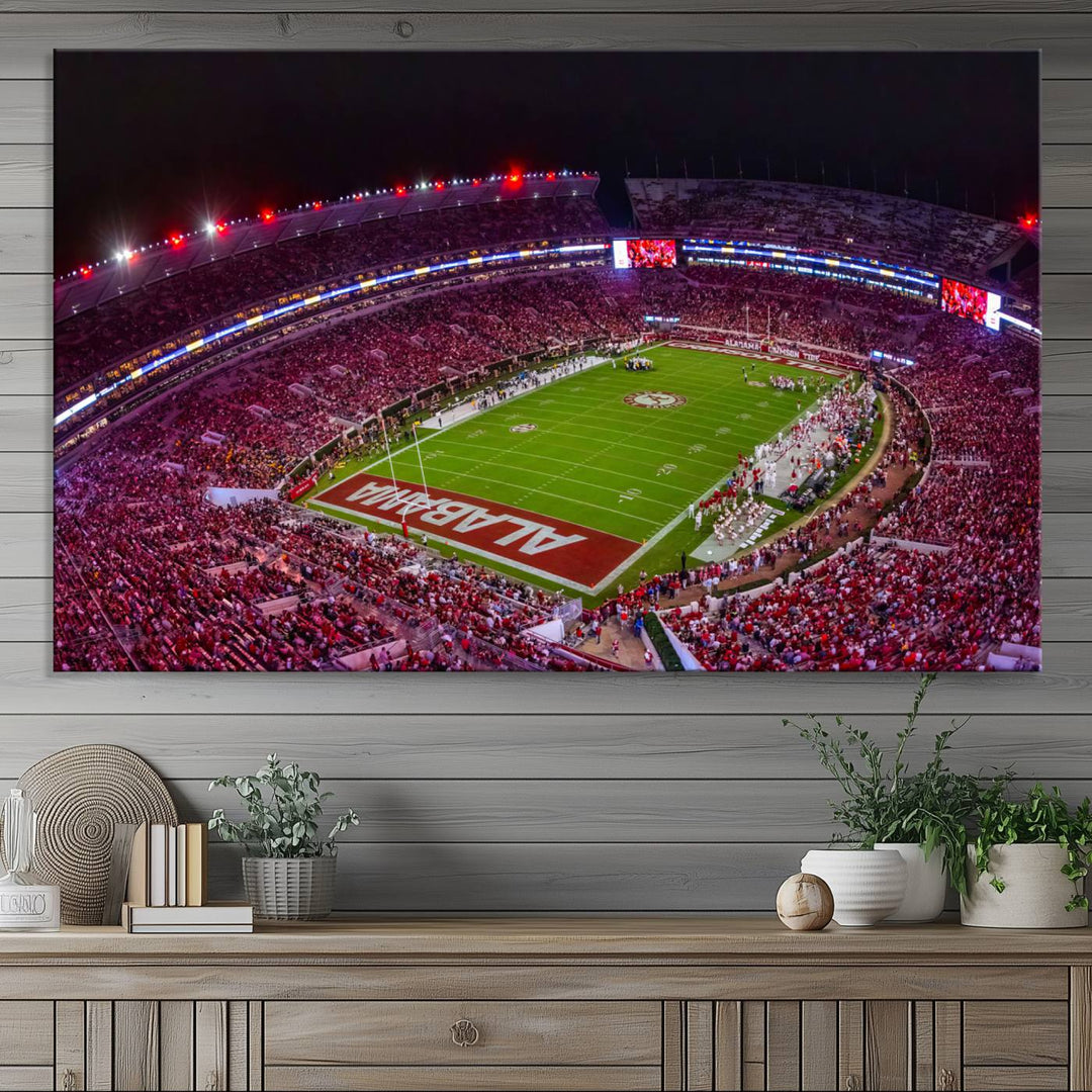 The living room features a Bryant-Denny Stadium Night Game Triple Canvas Wall Art.