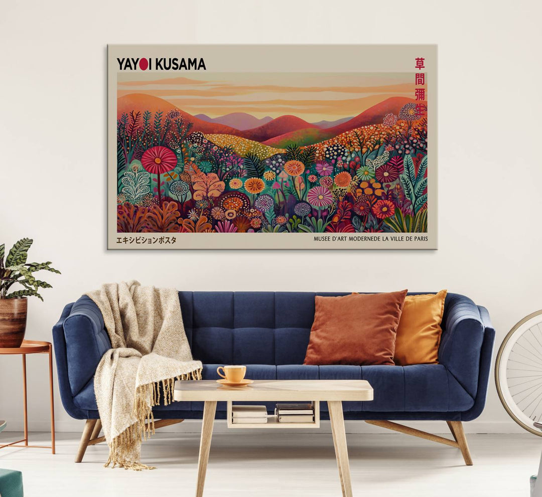 A framed Yayoi Kusama abstract landscape art print adorns the wall.