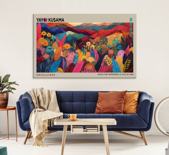 A Yayoi Kusama 1986 wall art print adds color in a modern living room.