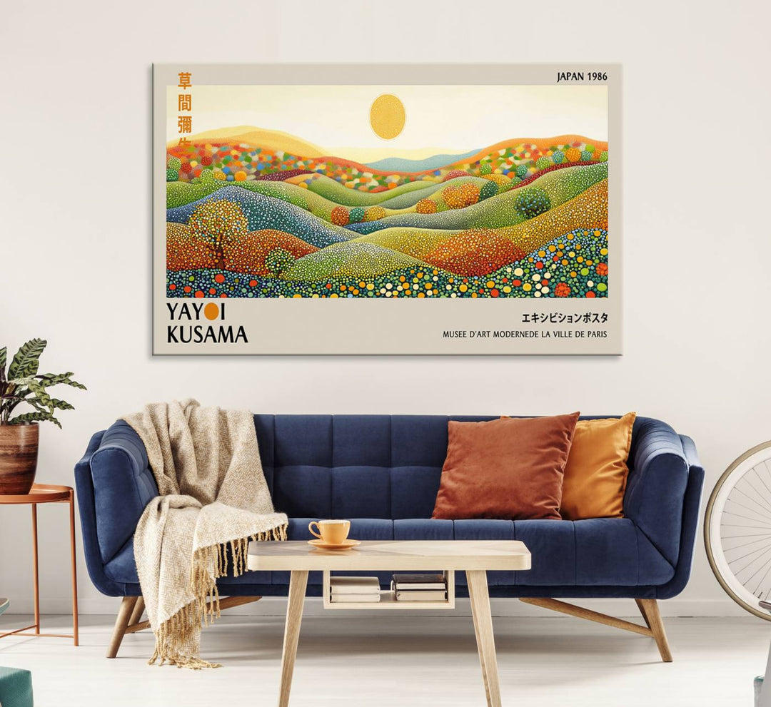 The Yayoi Kusama Wabi Sabi Japanese Wall Art Print features a vibrant landscape with dots, sun, and mountains.