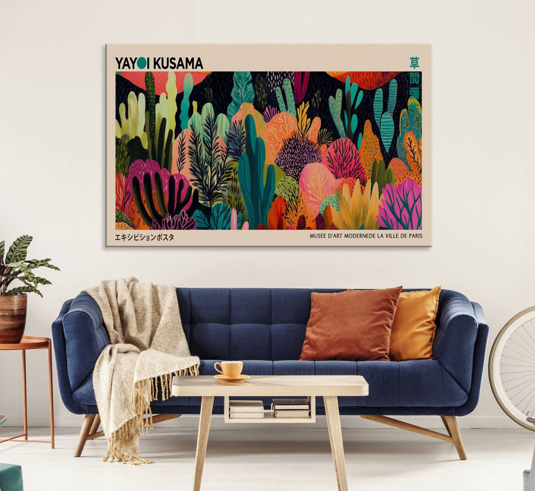 A vibrant Yayoi Kusama Wall Art Canvas Print showcases intricate abstract flora on a light background.