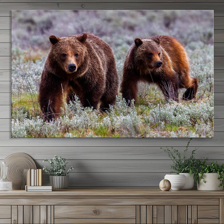 The "Grizzly 399 in Wild Flowers" wall art canvas print, showcasing grizzly bears amidst vibrant wildflowers, elegantly captures the enchanting essence of nature. This handmade piece from the USA brings striking beauty to any space.