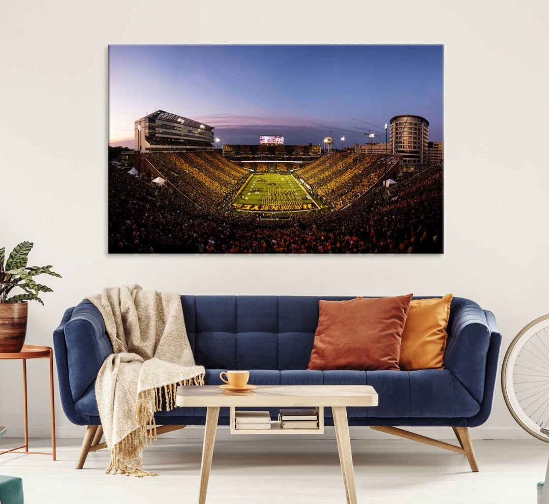 The Iowa Hawkeyes Kinnick Stadium Wall Art Canvas Print captures a sunset scene, making it perfect for display on a wall.