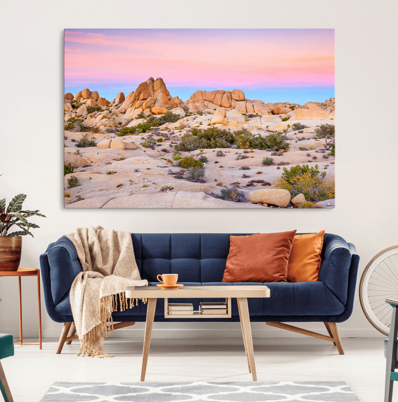 A breathtaking desert landscape featuring rugged rock formations under a vibrant pastel sunset sky, capturing the warmth and serenity of a Southwestern wilderness.