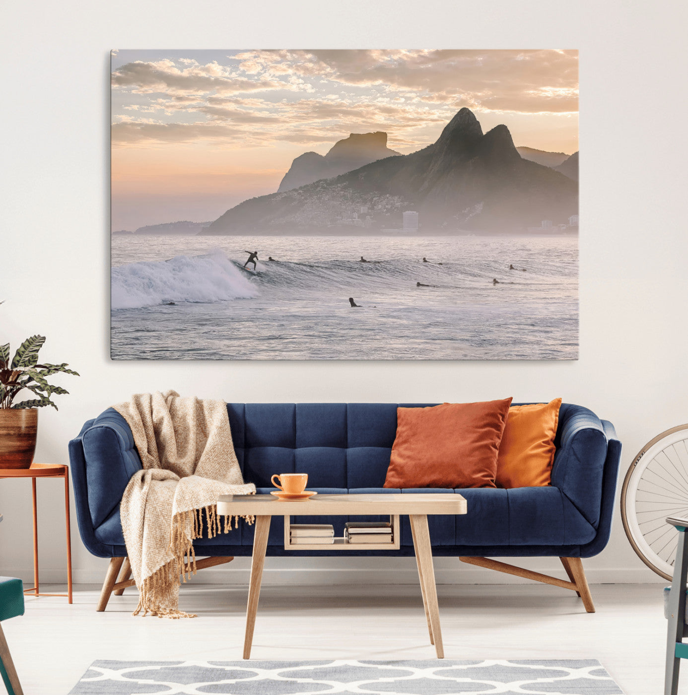 A surfer rides a golden hour wave near misty coastal mountains, surrounded by fellow surfers, capturing the spirit of a coastal adventure.