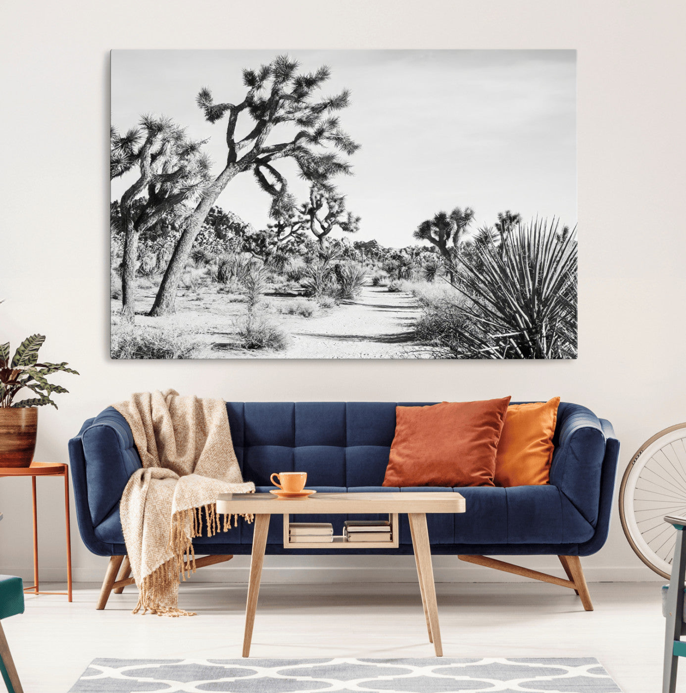 Canvas of a Joshua Tree forest in black and white tones, featuring a desert path and spiky vegetation, ideal for minimalist or rustic decor.