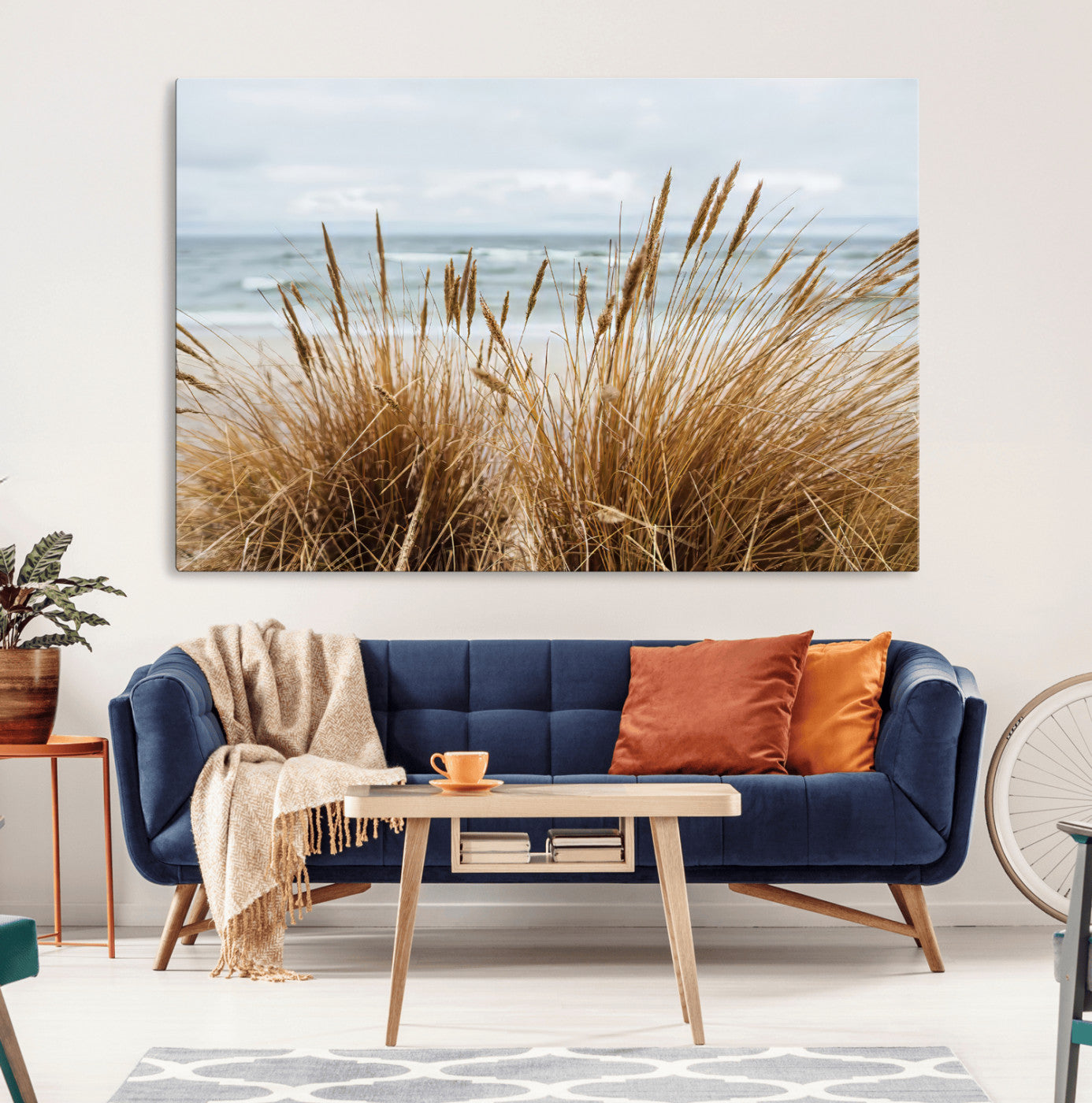 Canvas of golden beach grass swaying by the ocean under a soft cloudy sky, perfect for neutral-toned or coastal minimalist decor.