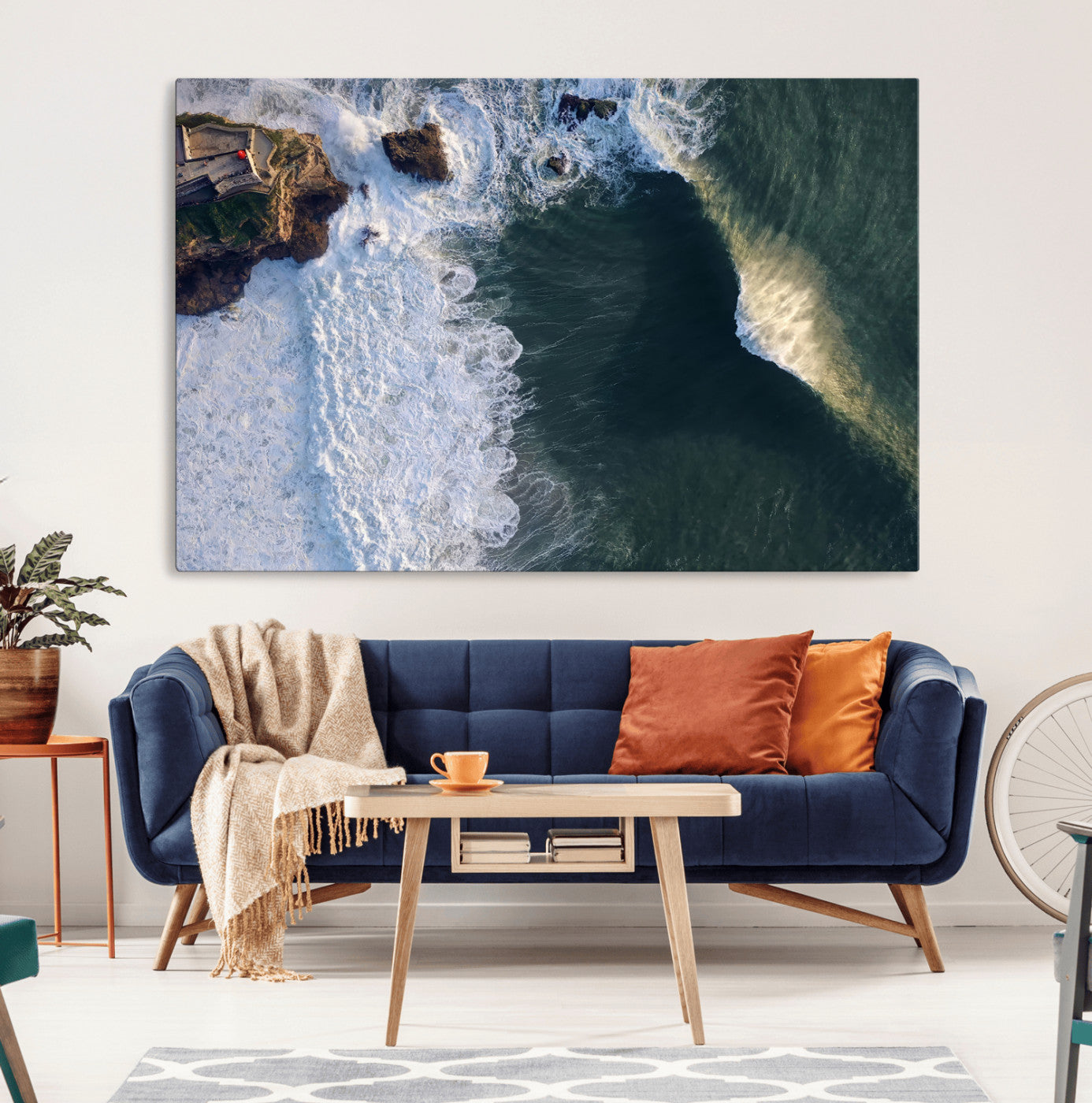 Canvas showing an aerial view of crashing waves along the Nazaré coastline, perfect for dramatic coastal or ocean-themed home decor.