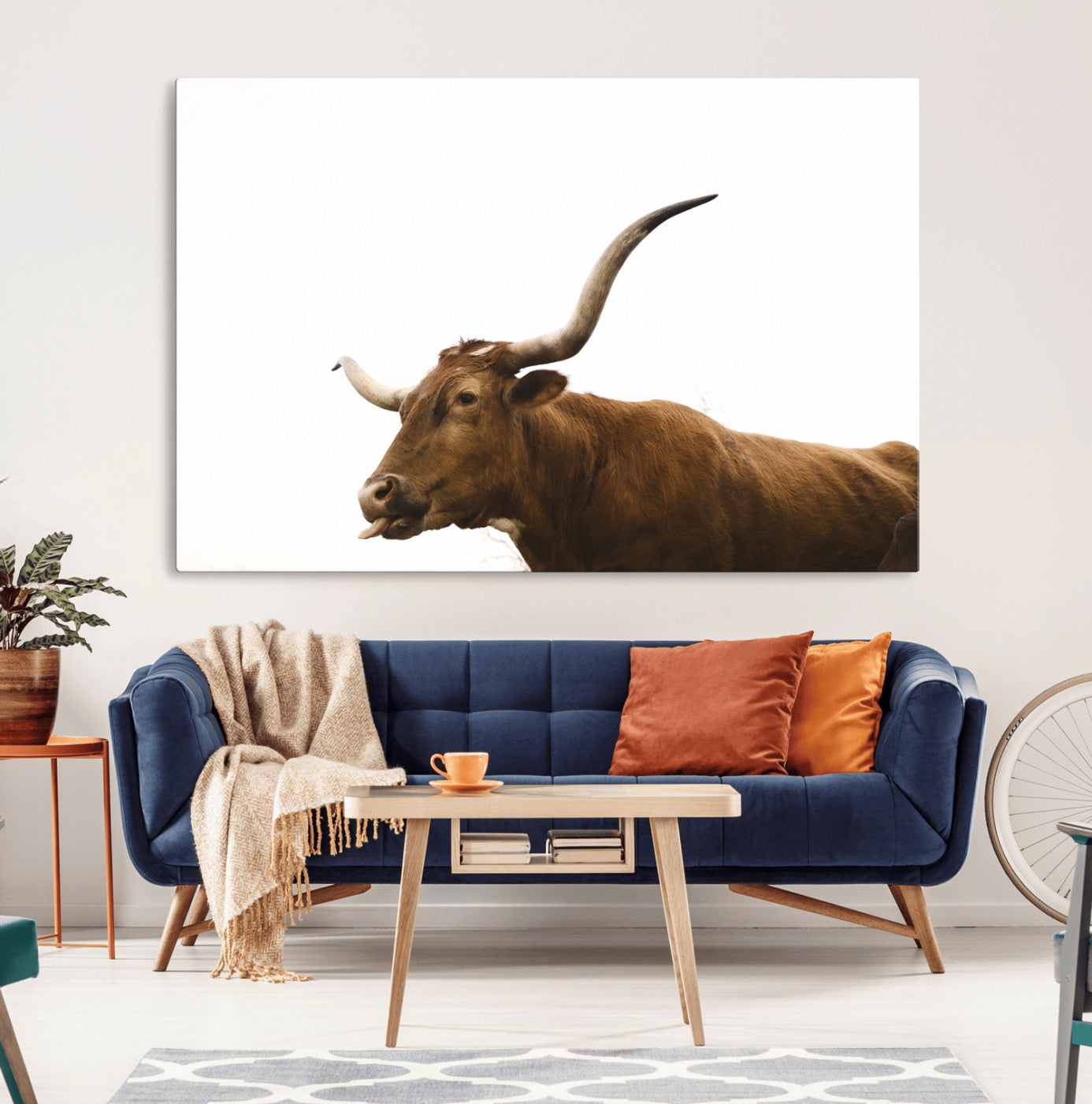 Side view of a brown Longhorn cow with curved horns on white background, perfect for rustic farmhouse or western-style home decor.