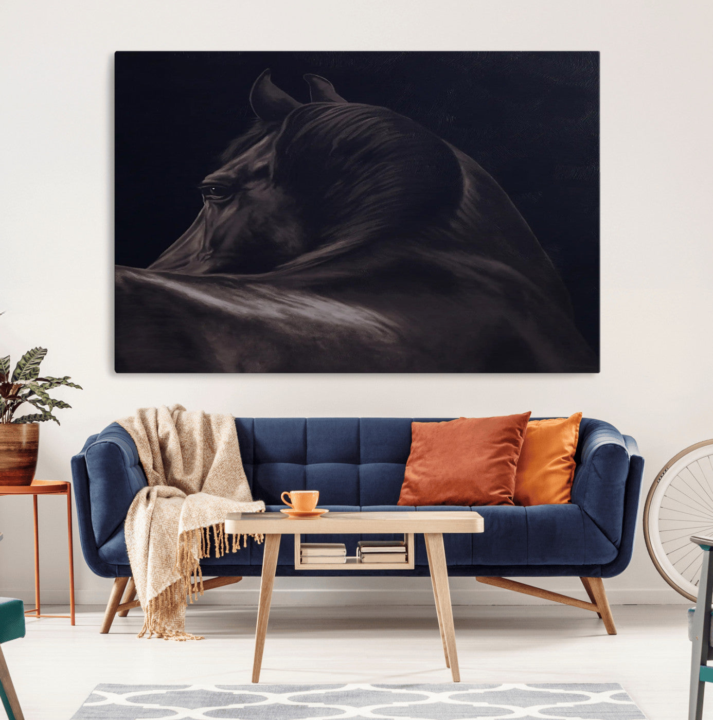 Moody black horse portrait with dramatic lighting on dark background, ideal for rustic, modern or Western style home decor.