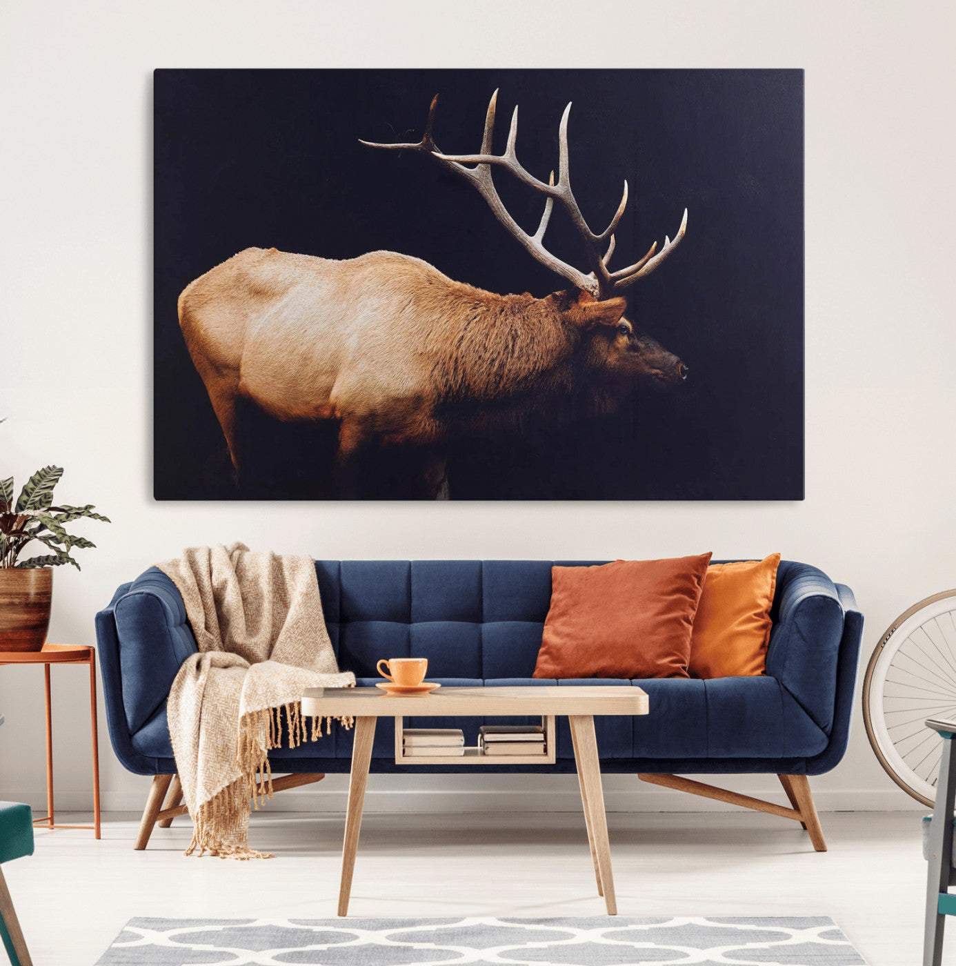 Side view of a majestic elk with large antlers against dark background, perfect for rustic lodge or cabin style home decoration.