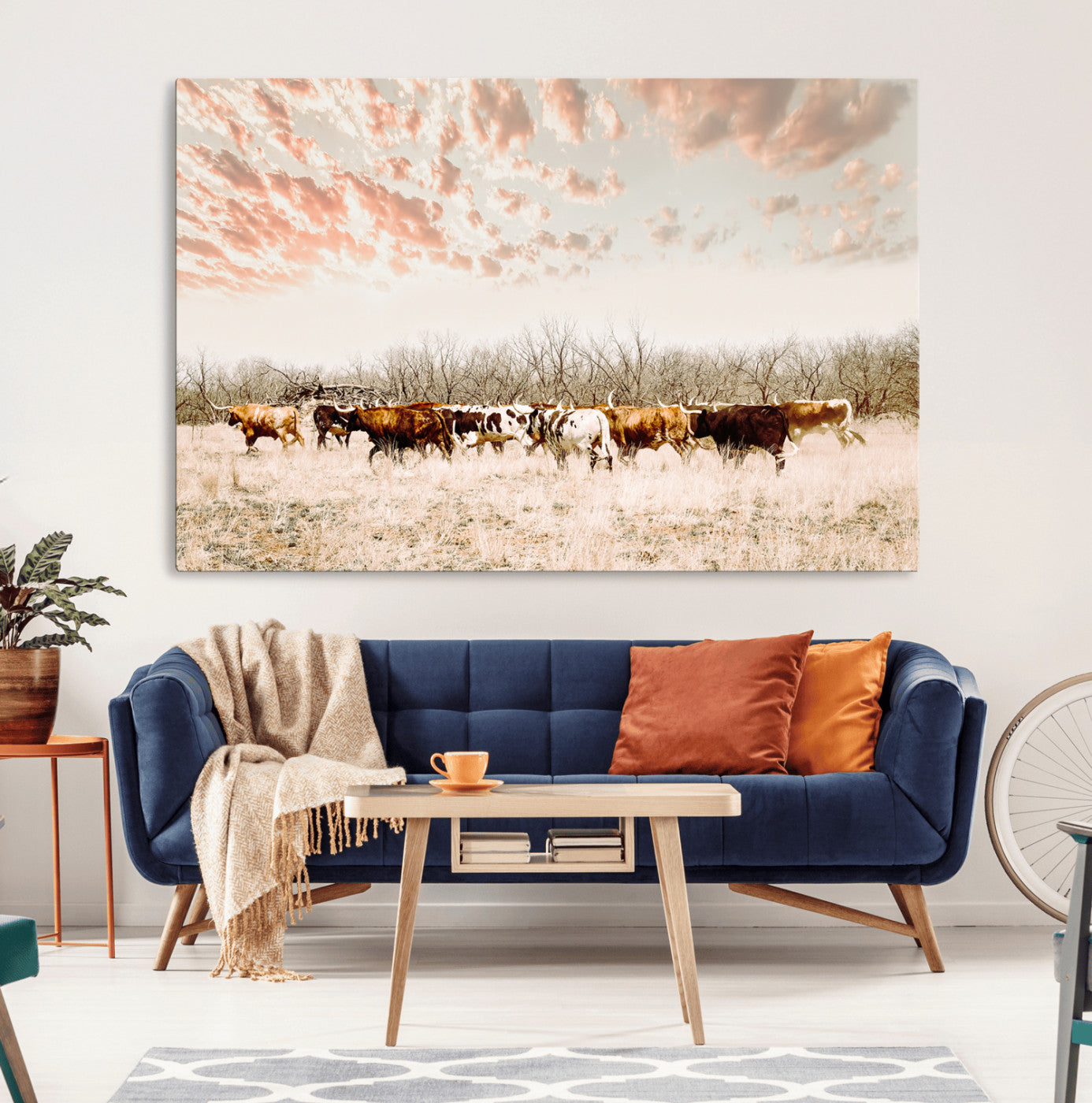 Cattle herd in a soft-toned field under a pastel pink sky, creating a peaceful rustic feel, perfect for farmhouse or western-themed spaces.