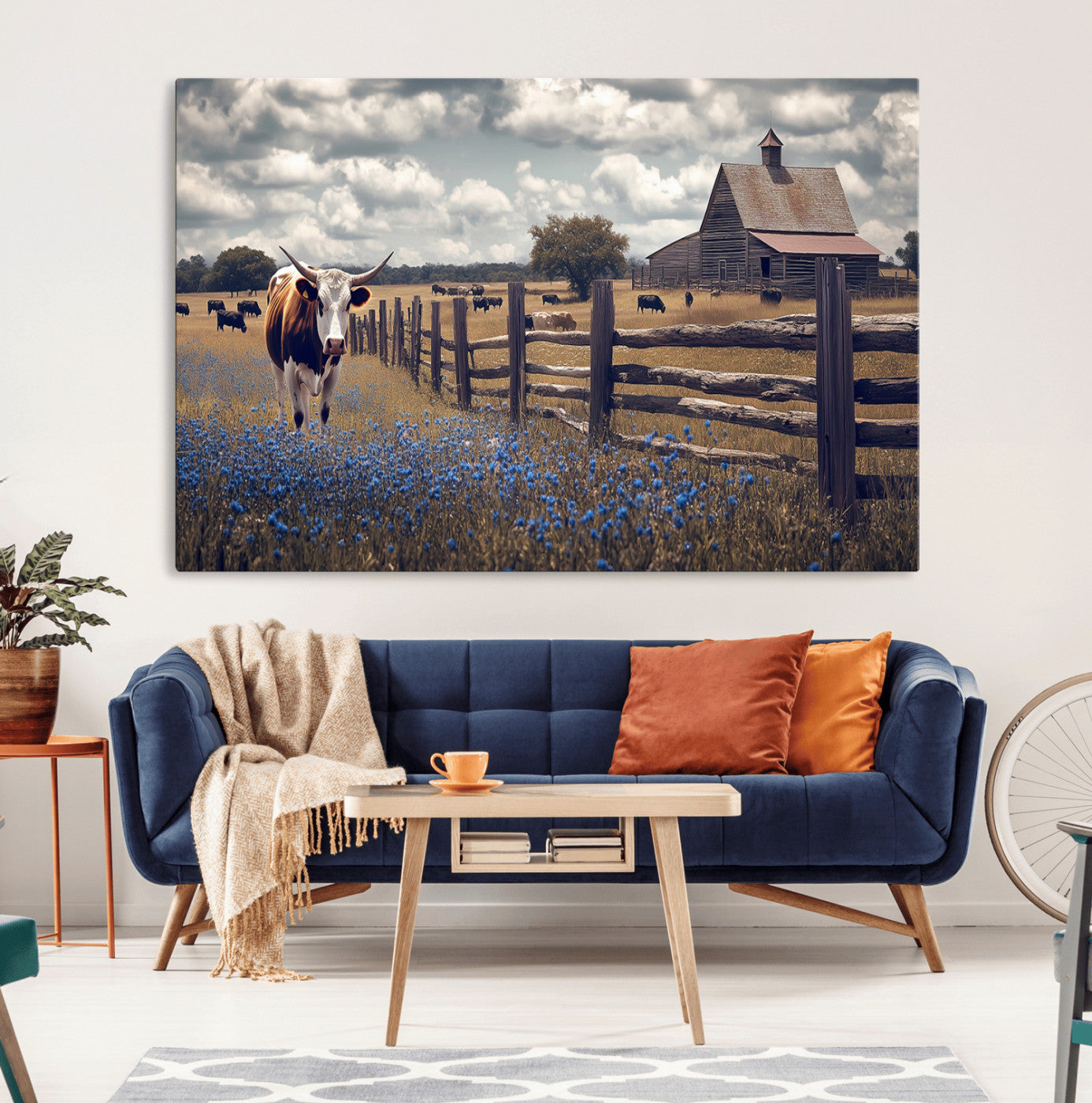 Framed canvas print of a Texas Longhorn near a rustic barn and fence, ideal for farmhouse or western-style home wall decor.