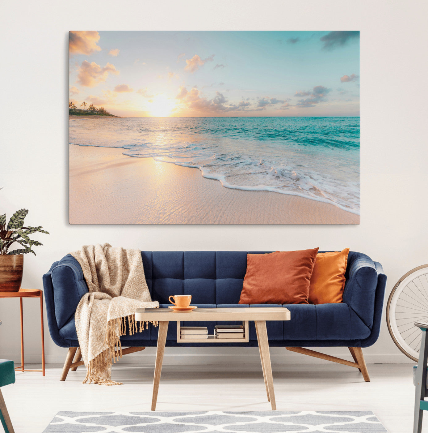 Golden sunset over a tropical beach with gentle ocean waves and soft white sand, creating a peaceful and relaxing coastal scene.