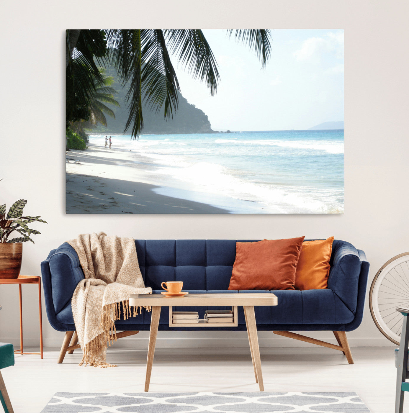 Tropical beach with palm tree shadows, white sand, and turquoise ocean waves, creating a serene and relaxing island escape atmosphere.