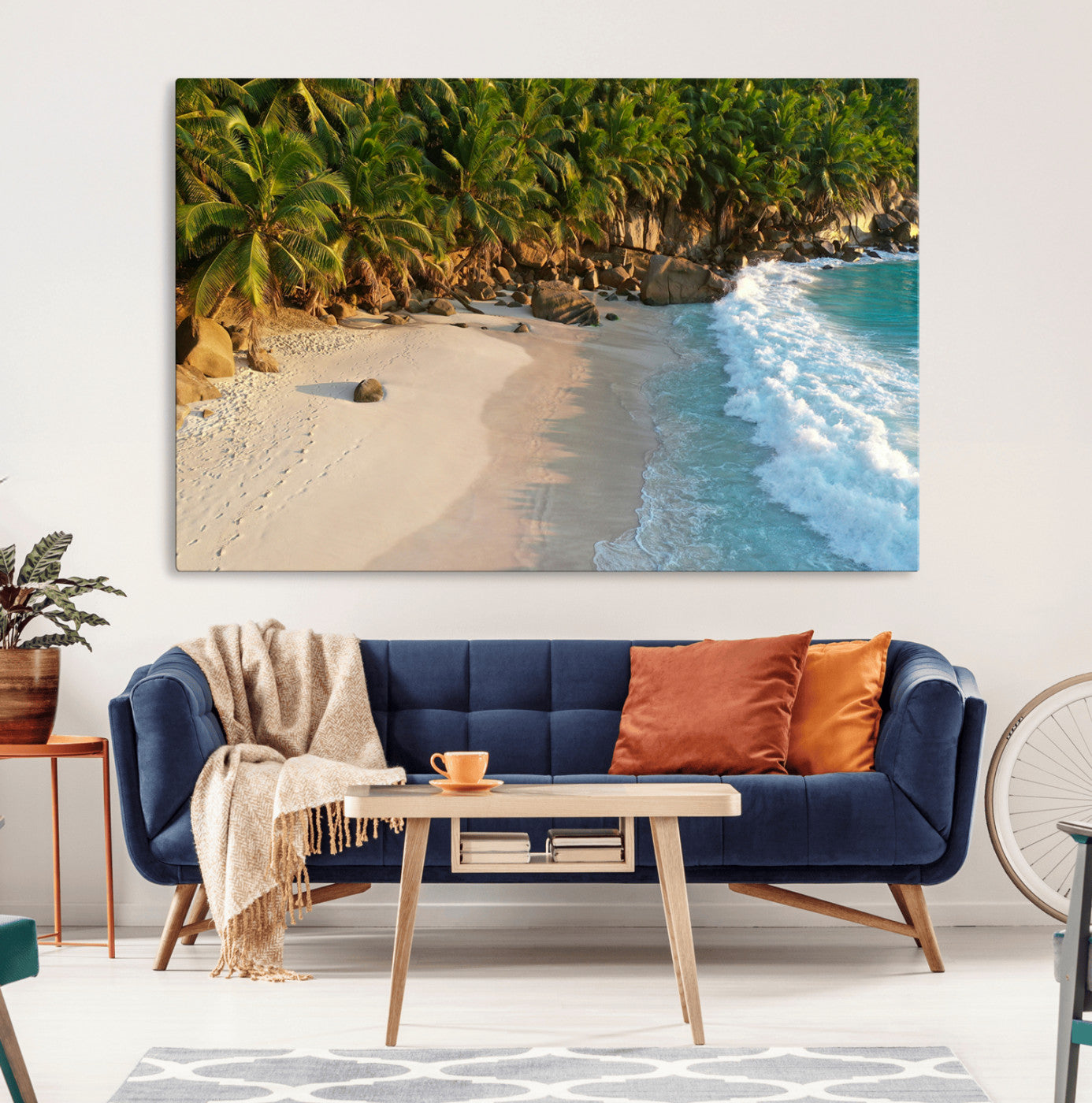 Tropical beach with golden sand, turquoise ocean waves, and lush palm trees, creating a serene coastal paradise for beach-themed decor.