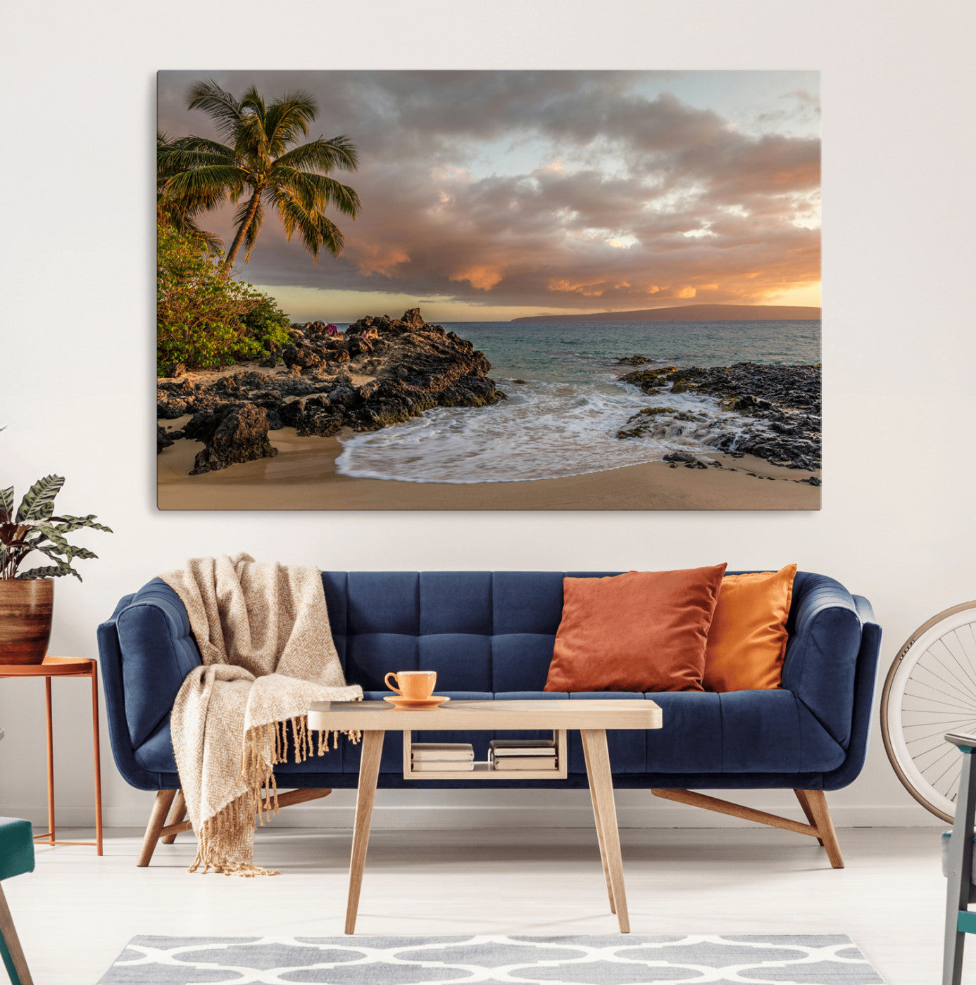 Golden sunset over a tropical beach with palm trees, rocky shoreline, and gentle ocean waves, perfect for coastal and island-inspired decor.