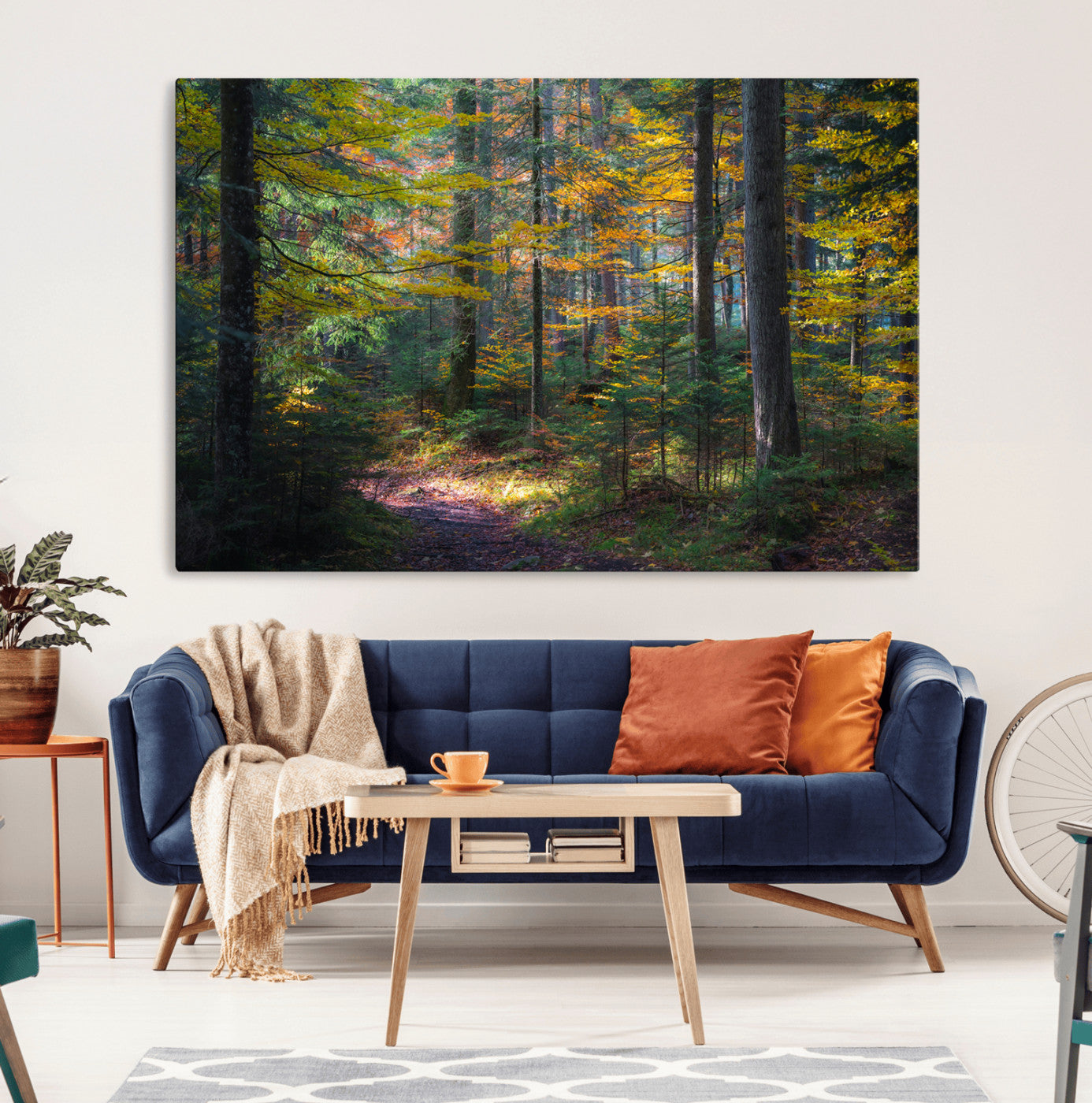 A serene autumn forest with golden and green leaves, a misty atmosphere, and a sunlit pathway, creating a tranquil nature-inspired wall art piece.