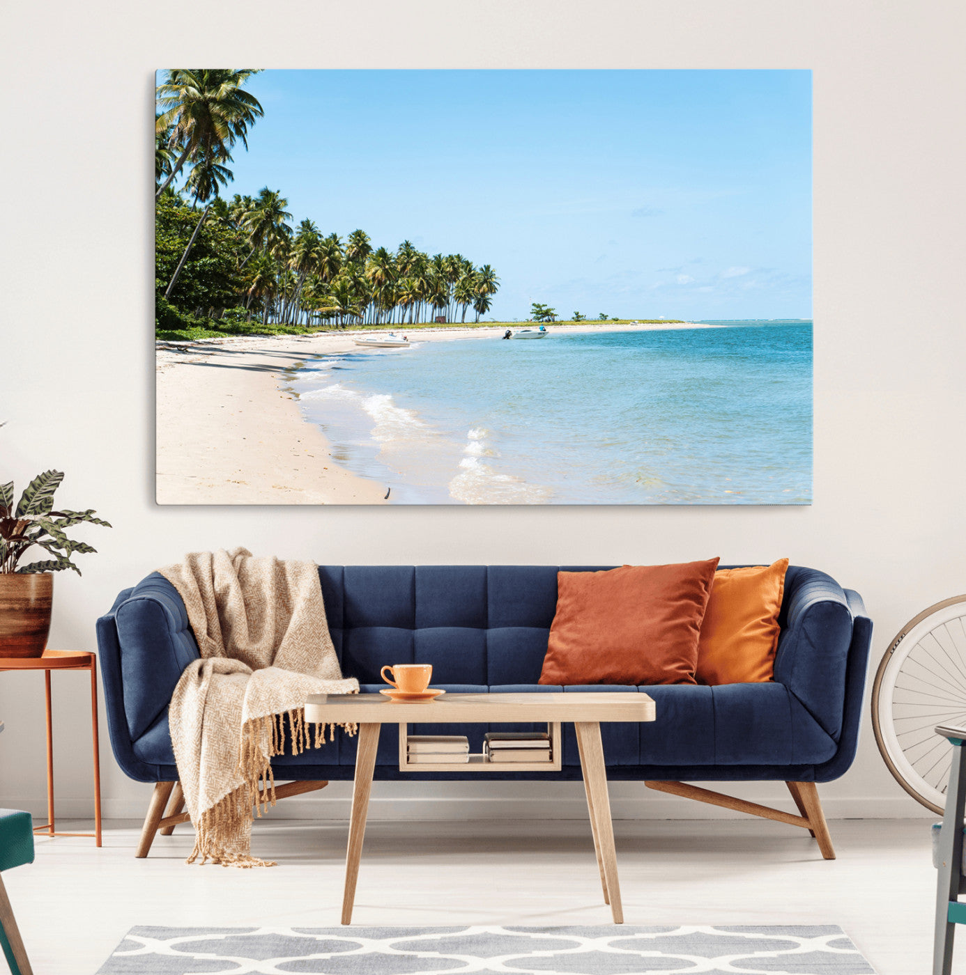 A serene tropical beach with clear blue water, soft sand, and lush palm trees under a bright sky, creating a peaceful island paradise atmosphere.