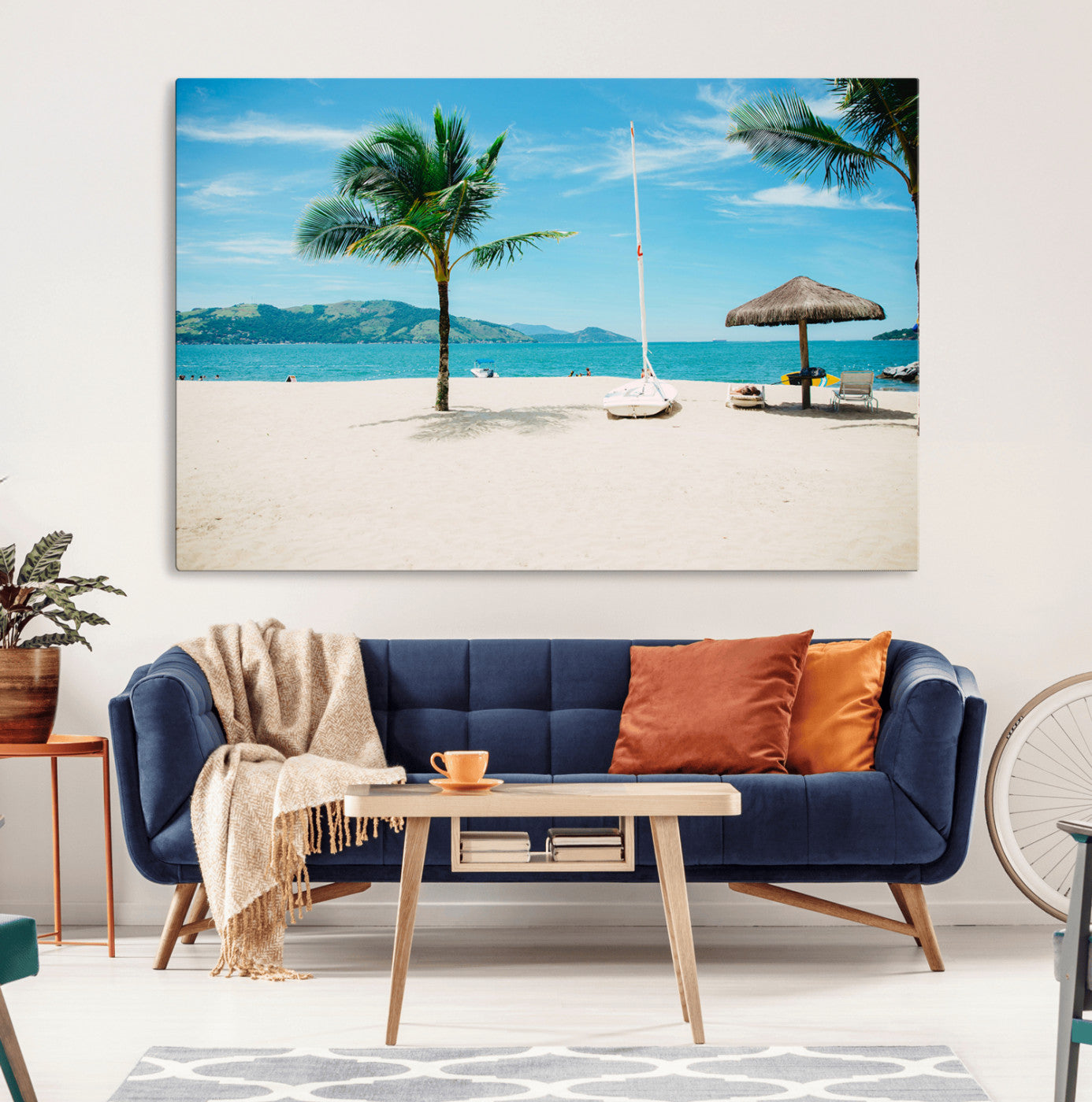 Tropical beach scene with palm trees, a white sailboat, and turquoise ocean waters under a bright blue sky, creating a peaceful summer vibe.