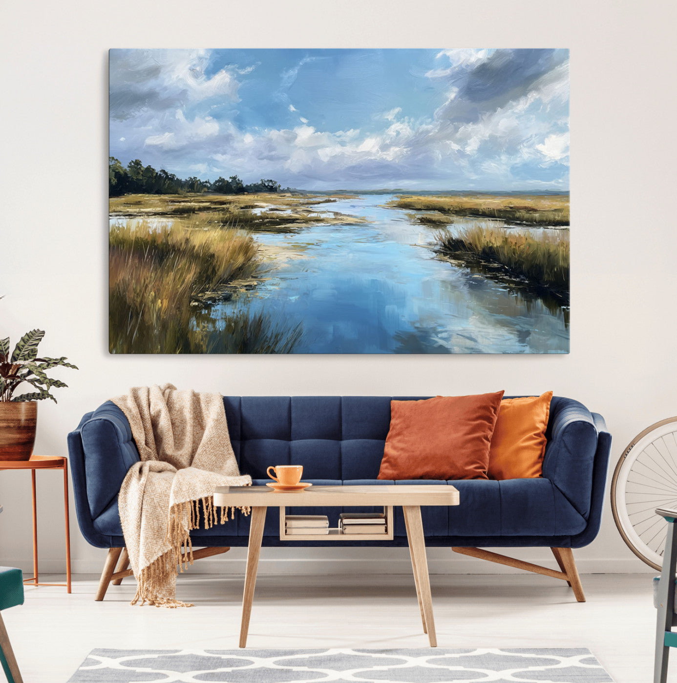 A beautiful, painterly landscape of a calm river winding through a marsh, with vibrant green grasses and a bright blue sky filled with fluffy clouds.