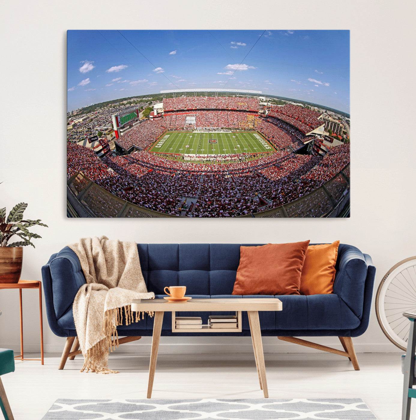 An William Brice-Stadium view of a full football stadium with cheering fans and clear blue skies, capturing the excitement and energy of the game.
