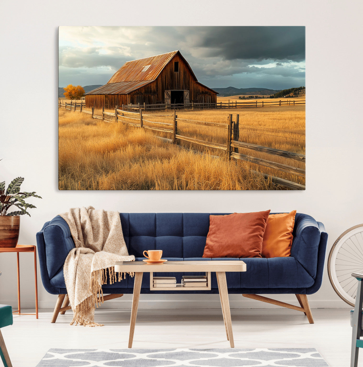 "Golden fields surrounding a rustic barn with a weathered roof, a wooden fence, and dramatic skies with sunlight breaking through the clouds."