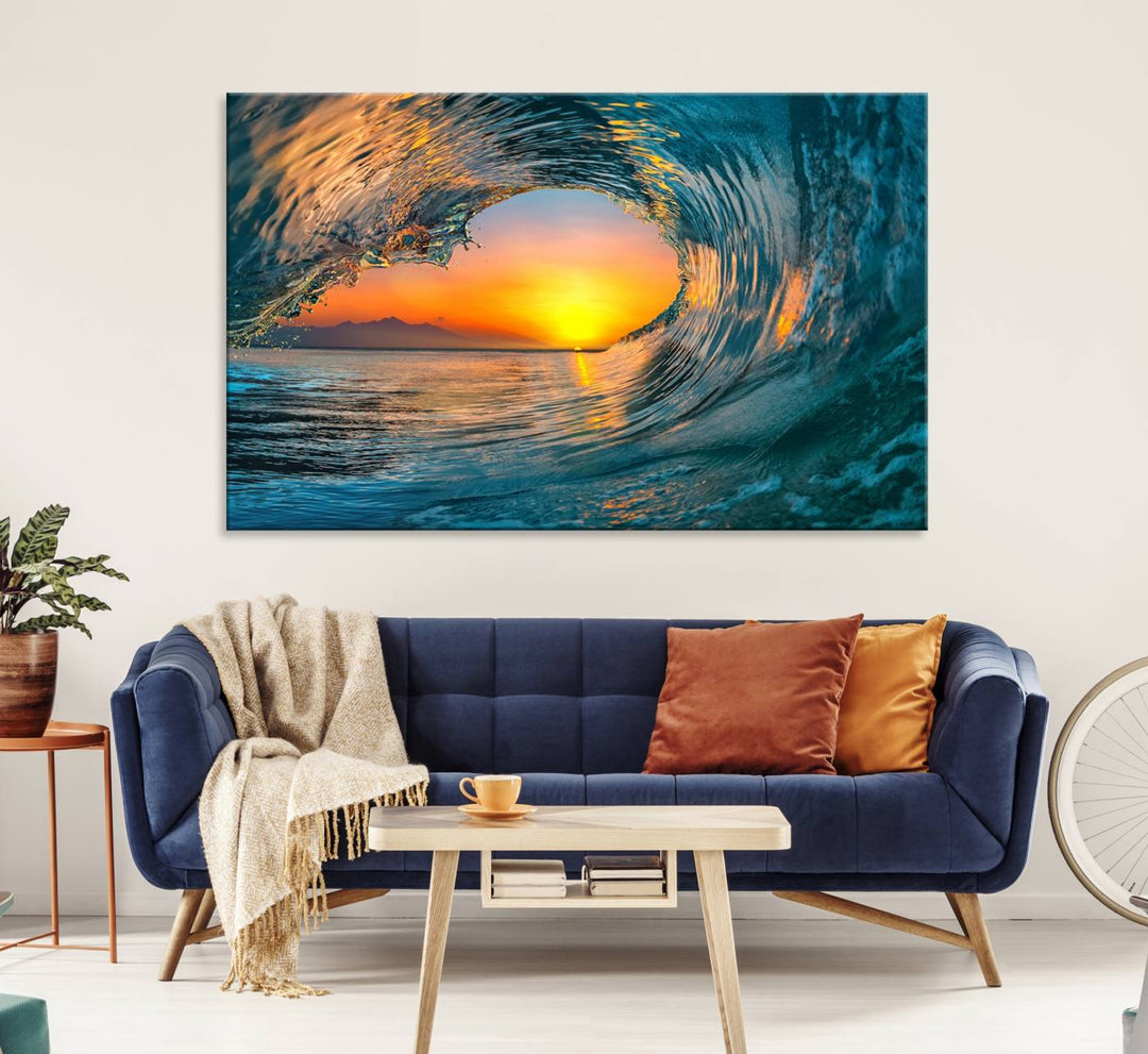 The Ocean Wave Sunset Wall Art canvas print features a vibrant ocean wave at sunset, forming a tunnel with silhouetted mountains.