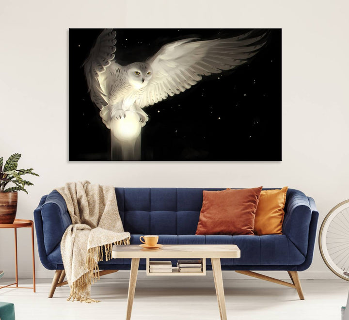 The Night Owl Art graces the wall with its depiction of a snowy owl on a glowing orb, perfect for modern decor.